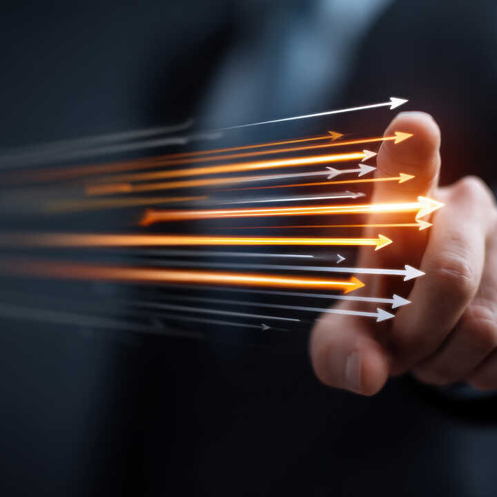 A finger following arrows moving across the screen, representing Our Vision